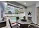 Relaxing screened-in pool area featuring a covered lounge area and privacy at 5117 Whispering Leaf Trl, Valrico, FL 33596