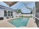 Enjoy the tranquility of this screened-in pool, creating a serene outdoor living space at 5117 Whispering Leaf Trl, Valrico, FL 33596