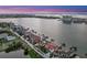 Panoramic aerial view showcasing waterfront homes, private docks, and expansive water views at 5287 61St S Ave, St Petersburg, FL 33715