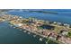 Waterfront homes feature private boat docks, pools, and meticulously landscaped yards with picturesque water views at 5287 61St S Ave, St Petersburg, FL 33715