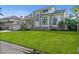 Beautiful home with lush green lawn and neutral color palette at 5287 61St S Ave, St Petersburg, FL 33715