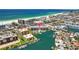 Breathtaking aerial view of a beachfront condo community with waterfront access and stunning Gulf Coast scenery at 5445 Gulf Blvd # 210, St Pete Beach, FL 33706