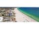 Expansive beach view with hotels, resorts, and crystal waters, perfect for tourists at 5445 Gulf Blvd # 210, St Pete Beach, FL 33706