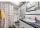 Bathroom featuring a shower-tub combination, stylish vanity, and modern fixtures at 5919 35Th N Ave, St Petersburg, FL 33703