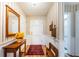 Bright foyer with hardwood floors, decorative mirror, and a welcoming ambiance at 5919 35Th N Ave, St Petersburg, FL 33703