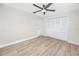 This bedroom features ample closet space, ceiling fan and floorspace at 6920 13Th N Ave, St Petersburg, FL 33710