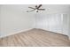 This bedroom features ample closet space, ceiling fan and floorspace at 6920 13Th N Ave, St Petersburg, FL 33710