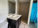 Bathroom featuring a vanity and walk-in shower at 7806 N Orleans Ave, Tampa, FL 33604