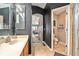 The bathroom offers neutral tile flooring and an arched doorway leading to the main bedroom at 8217 Canterbury Lake Blvd, Tampa, FL 33619