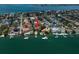 High aerial view showcasing a waterfront neighborhood with a pool, private docks, and scenic water views at 841 Ponce De Leon Dr, St Petersburg, FL 33715