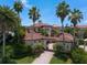 An aerial view of a Mediterranean-style home showcasing its red tile roof and manicured landscaping at 841 Ponce De Leon Dr, St Petersburg, FL 33715