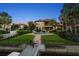 Waterfront backyard featuring a pool, dock, and well-manicured lawn and tropical foliage at 841 Ponce De Leon Dr, St Petersburg, FL 33715