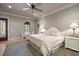 A tranquil bedroom features a cozy breakfast nook, large windows, and a lovely white dresser set at 841 Ponce De Leon Dr, St Petersburg, FL 33715