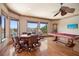 Spacious game room with a pool table, game table, and expansive windows overlooking the water at 841 Ponce De Leon Dr, St Petersburg, FL 33715
