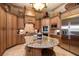 Gourmet kitchen featuring custom cabinetry, granite countertops, stainless steel appliances, and a center island at 841 Ponce De Leon Dr, St Petersburg, FL 33715
