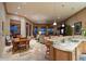 Open-concept living room features a breakfast bar, comfortable seating, and expansive views at 841 Ponce De Leon Dr, St Petersburg, FL 33715