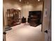 Spacious bonus room with home office setup including a desk and shelves, perfect for work and exercise at 841 Ponce De Leon Dr, St Petersburg, FL 33715