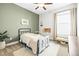 Cozy bedroom with warm colors, playful decor, and comfortable carpet at 8460 Capstone Ranch Dr, New Port Richey, FL 34655