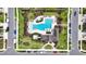 Top-down view of luxurious community pool, showcasing modern design and ample lounging space at 8460 Capstone Ranch Dr, New Port Richey, FL 34655