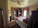 Bedroom with a comfortable bed, closet, and vintage decor, offering a cozy retreat at 8502 N Branch Ave, Tampa, FL 33604