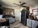 Compact kitchen with essential appliances and adjacent dining area at 8502 N Branch Ave, Tampa, FL 33604