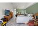 Spacious bedroom with tray ceilings, tiled flooring, and neutral colored walls at 9276 Ashley Dr, Weeki Wachee, FL 34613