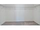 Walk-in closet features a single shelf for organizing your personal belongings at 9828 Branching Ship Trace, Wesley Chapel, FL 33545