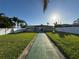 Spacious backyard with lush green grass, offering a private outdoor retreat at 6034 Bayou Grande Ne Blvd, St Petersburg, FL 33703