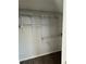 Well-organized closet with multiple shelves and hanging rods for storage at 6034 Bayou Grande Ne Blvd, St Petersburg, FL 33703