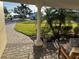 View of a beautifully designed front porch with decorative columns and potted plants at 6034 Bayou Grande Ne Blvd, St Petersburg, FL 33703