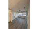 A bright room featuring french doors and neutral walls and light fixture at 6034 Bayou Grande Ne Blvd, St Petersburg, FL 33703