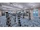 Spacious fitness center equipped with weights, treadmills, and other exercise equipment at 10486 Sea Breeze Ridge Dr, Englewood, FL 34223