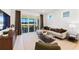 Beautiful living room features modern decor, stylish furniture, and bright natural light at 10486 Sea Breeze Ridge Dr, Englewood, FL 34223
