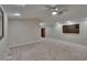 Open basement area with recessed lighting, ceiling fan, and tv at 10515 Canary Isle Dr, Tampa, FL 33647