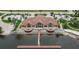 Aerial shot showcasing the Beach Club, its dock, and waterfront location with water views at 10515 Canary Isle Dr, Tampa, FL 33647