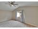 Bedroom features neutral carpet, vaulted ceilings and ceiling fan at 10515 Canary Isle Dr, Tampa, FL 33647