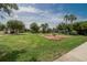 The green area includes fitness equipment surrounded by shade trees at 10515 Canary Isle Dr, Tampa, FL 33647