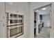 Chef's kitchen features stainless double oven, storage cabinets, and modern appliances at 10515 Canary Isle Dr, Tampa, FL 33647