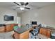 Office room featuring granite countertops, cabinet drawers, and chairs at 10515 Canary Isle Dr, Tampa, FL 33647