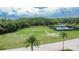 Community green space featuring a soccer field and tennis courts at 10515 Canary Isle Dr, Tampa, FL 33647