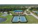 Aerial view featuring the community's tennis courts and recreational areas at 10515 Canary Isle Dr, Tampa, FL 33647