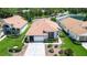Charming single-story home featuring a two-car garage, manicured landscaping, and inviting curb appeal at 11121 Cherrywood Ct, Spring Hill, FL 34609