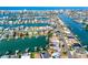 Stunning aerial view of a waterfront community with canals and beautiful homes at 11465 7Th E St, Treasure Island, FL 33706