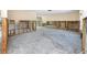 Spacious living room featuring unfinished walls, ready for customization, and ample natural light at 11465 7Th E St, Treasure Island, FL 33706