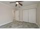 Bedroom with tiled floors and a view into another room at 12 Bayou Ln, Palm Harbor, FL 34683
