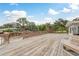 Spacious wooden deck with canal views, perfect for outdoor relaxation at 12 Bayou Ln, Palm Harbor, FL 34683