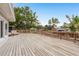 Expansive wooden deck great for entertaining with water views at 12 Bayou Ln, Palm Harbor, FL 34683
