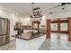 Stylish kitchen featuring granite countertops, stainless appliances, and a seamless open layout at 12 Bayou Ln, Palm Harbor, FL 34683