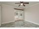 Bright room with tiled floors and sliding doors to a patio at 12 Bayou Ln, Palm Harbor, FL 34683