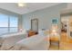 This bedroom is bathed in natural light and has two twin beds facing a window with a view at 1200 Gulf Blvd # 1704, Clearwater Beach, FL 33767